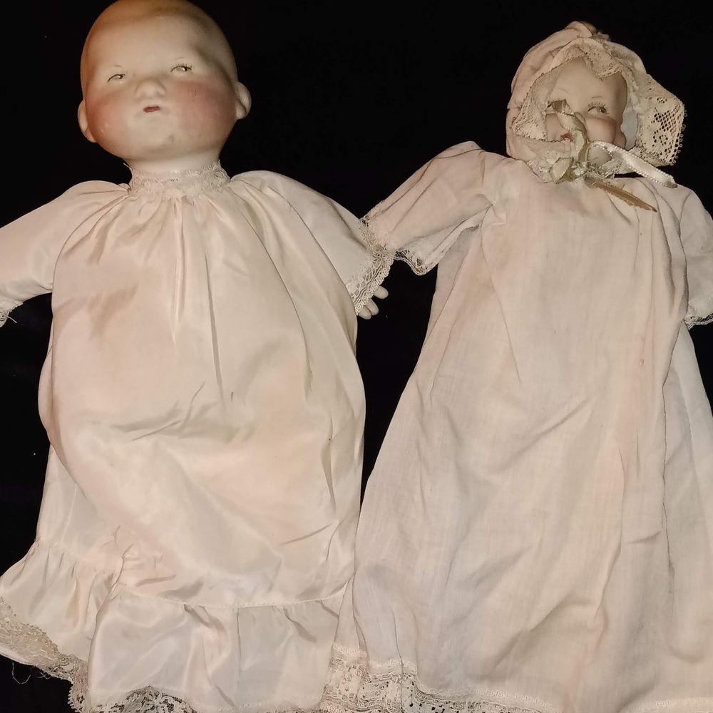Vintage Porcelain Doll On Left